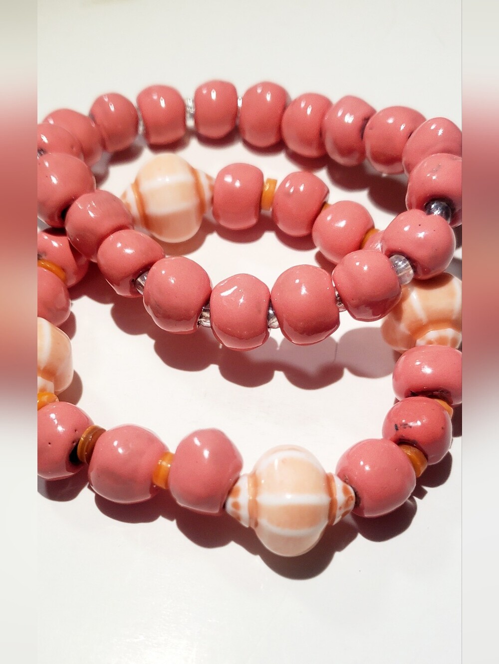 Pink Ceramic Bead Bracelet with Striped Accent Beads
